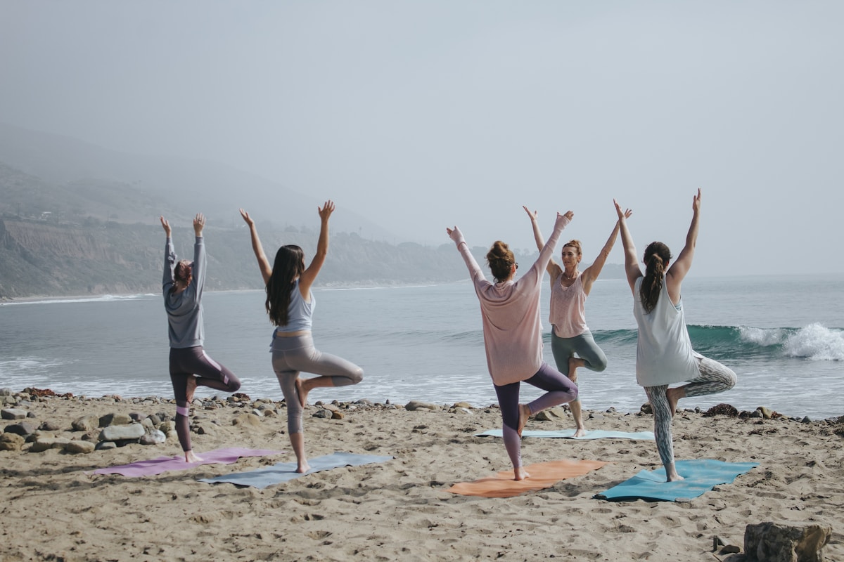 Serene meditation retreat setting with yoga mats overlooking nature